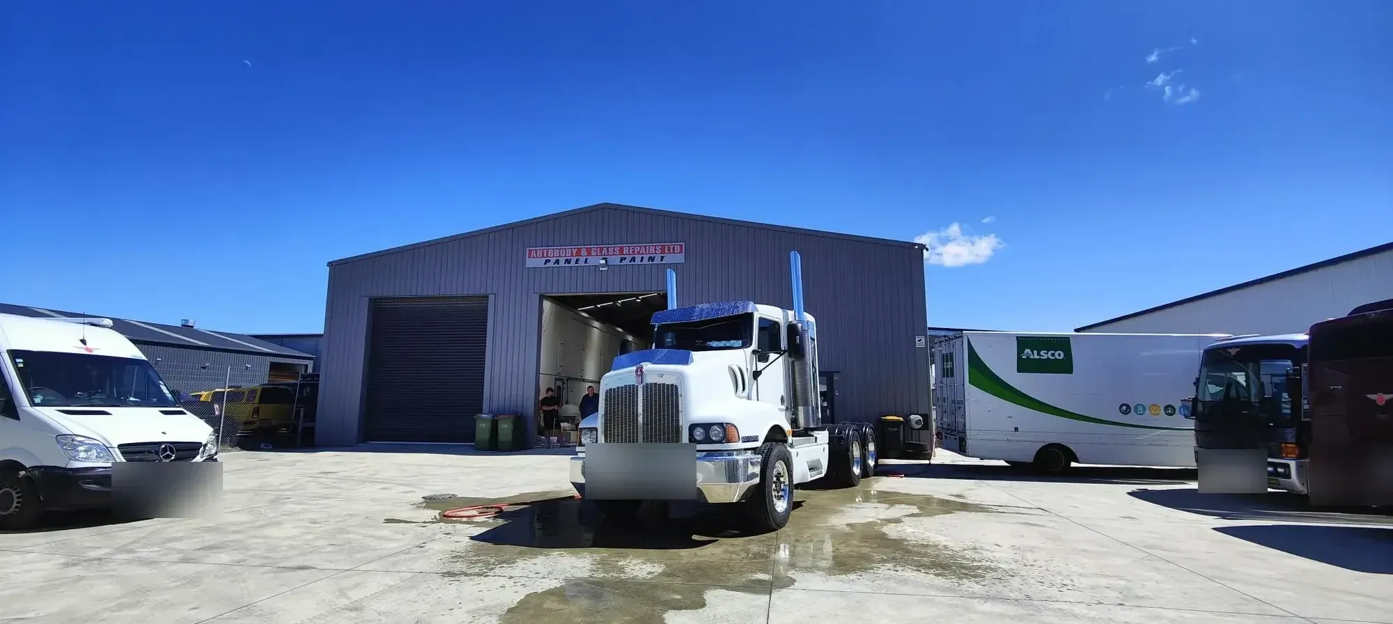Autobody & Glass Repairs workshop and yard