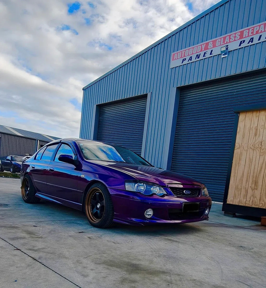 The same Ford Falcon finished in a deep purple chameleon respray