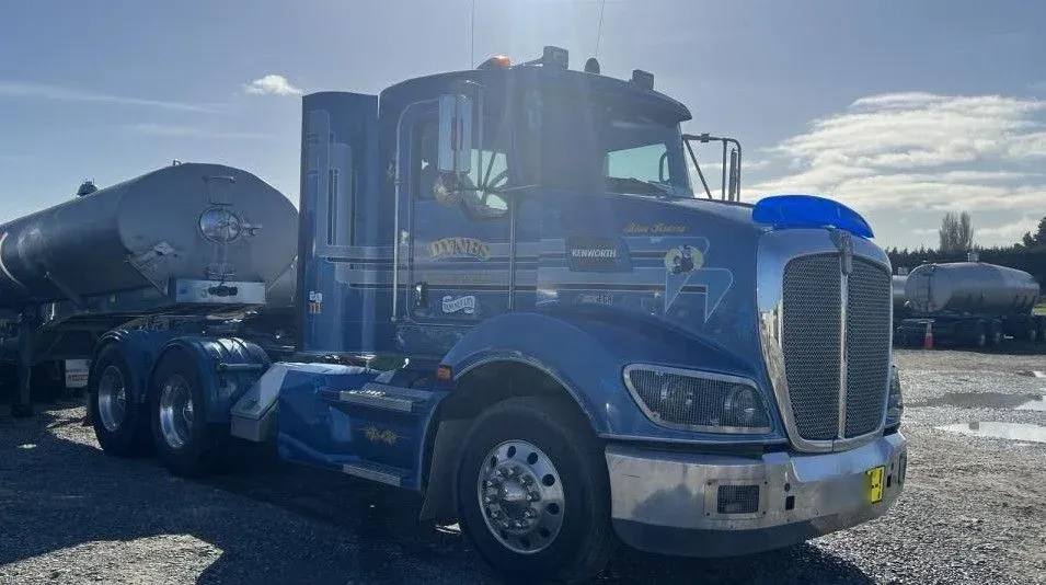 A Dynes Transport Kenworth in its original blue and gold livery before the respray