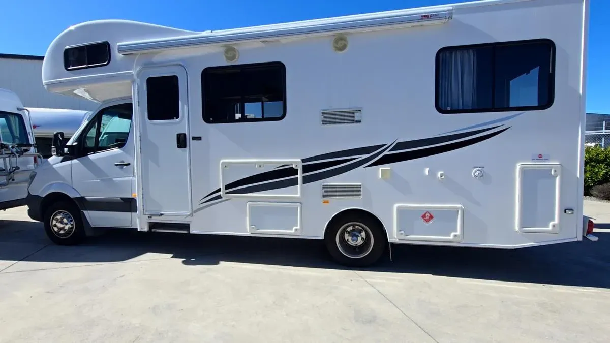 A white motorhome repaired and ready for collection