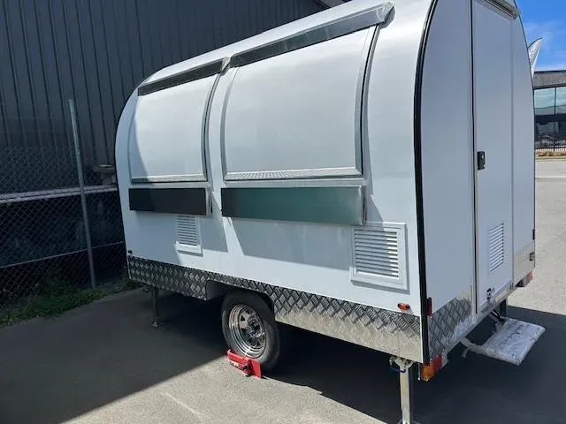 A custom trailer in bare primer