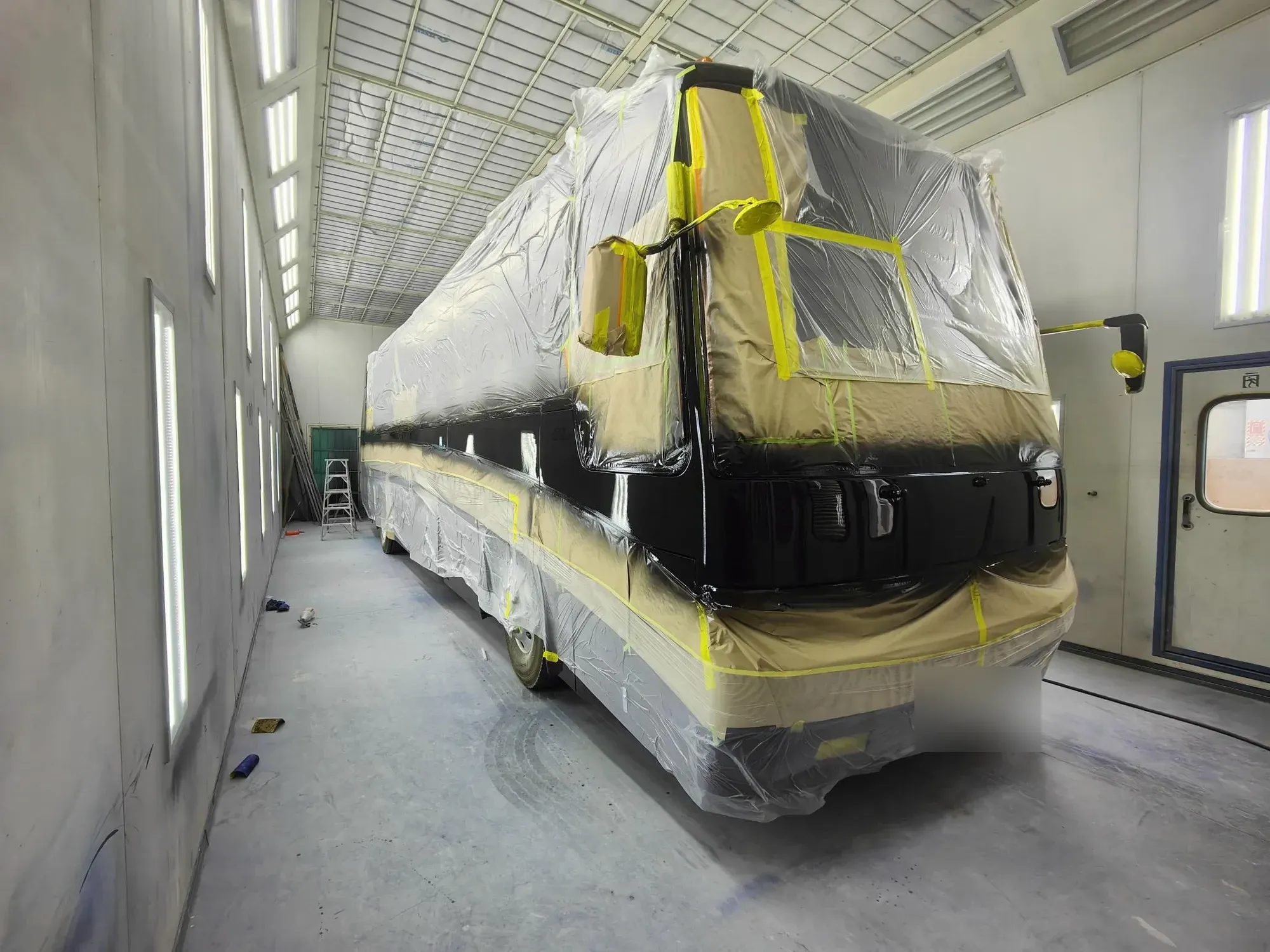 A vehicle in the 18-metre heated spray booth